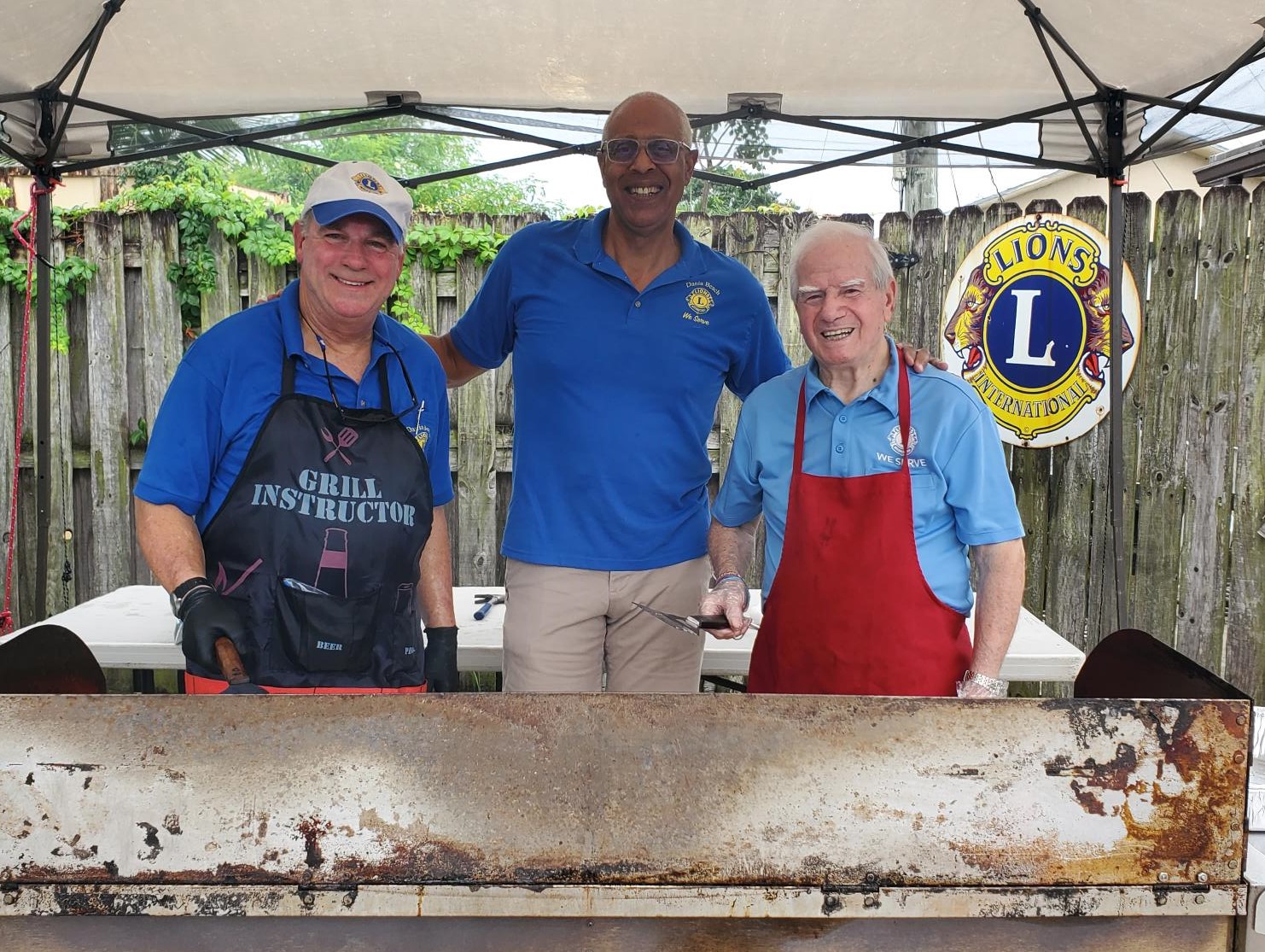 Lyons Club of Dania Beach leaders:  Alan Plaoli, D. Joe Payne, Louei Mariano