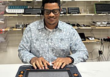 Teen with assistive technology